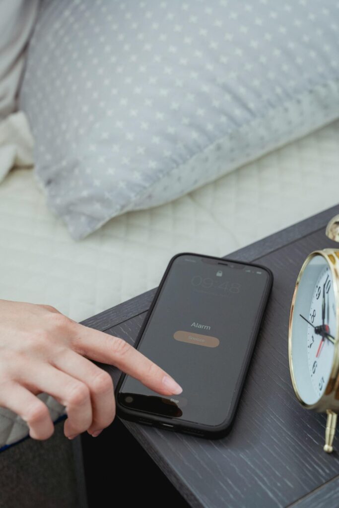 waking up stressed smartphone bedroom