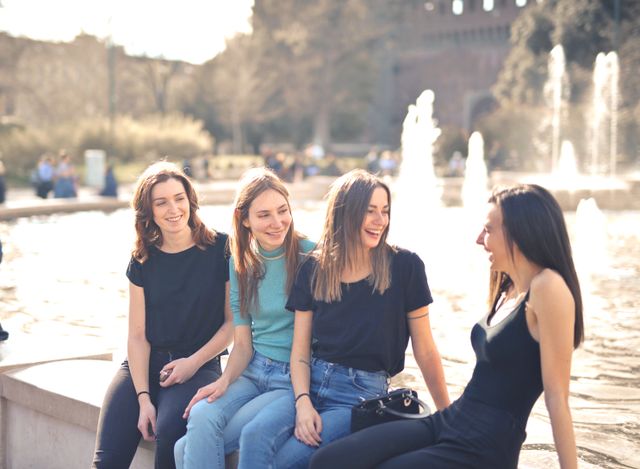 friends talking laughing supportive